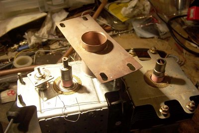 The parts for this, and a different magnetron shown too - with looser tolerances on the ring, but worse antenna end.
