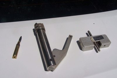 Brass, bullet, and some tools sitting on the back of my Volt (sun is nice for pictures).
