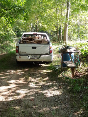 Removed the water getter barrel from the truck so I could get more wood in.