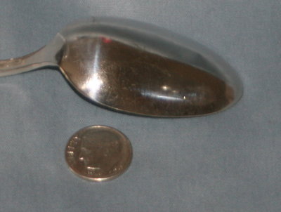 After final polish - it's not perfect, but hey, it's &quot;used&quot;.  The 90% Ag dime is a size reference