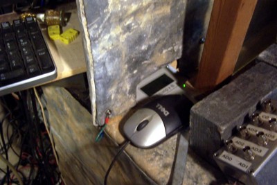 I can't see this in real life any better than the camera (look just above the mouse).