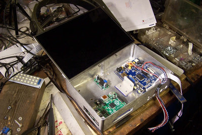 The basic pieces.  Pi is lower left, switcher is upper center, and HDMI panel driver on right.