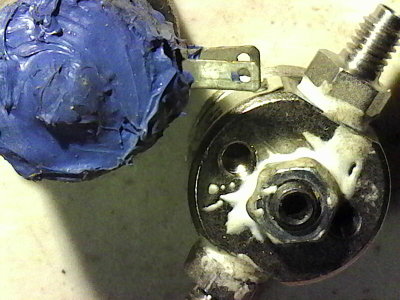 The ugly sides.  Various leaks plugged with sealants.