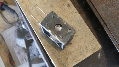 one of the magnets has a hole in it