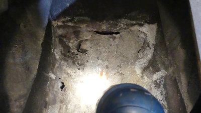 You are not supposed to be able to see the floor through the bottom of the woodstove!