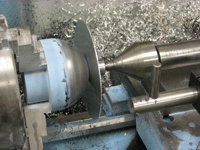 This is the mandrel with a new blank clamped in place.