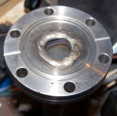 Reused flange and SS tubing welded in