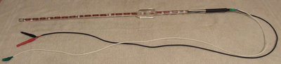 Two lengths of glass tube were joined by an acrylic coupling to achieve the correct length