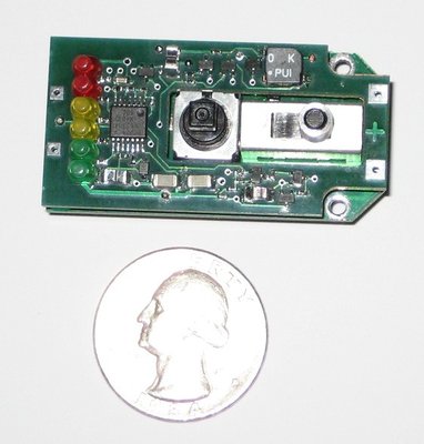 Circuit board with a quarter for reference